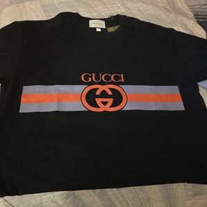 Gucci Black T-Shirt with Orange Logo and Gray Stripe